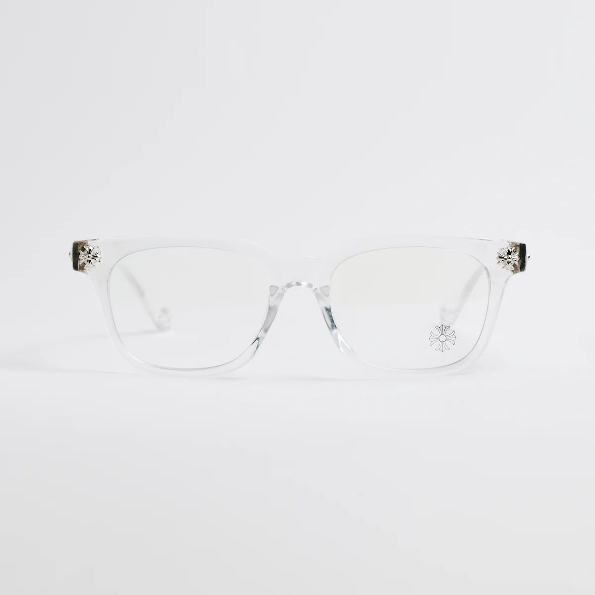 Clear eyeglasses with decorative temple tips on a white background