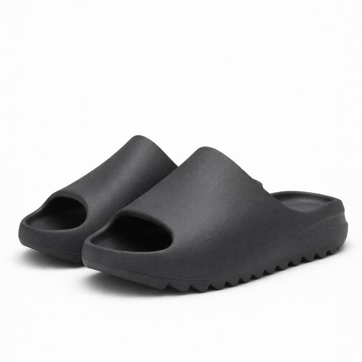 Pair of black slides on a white background