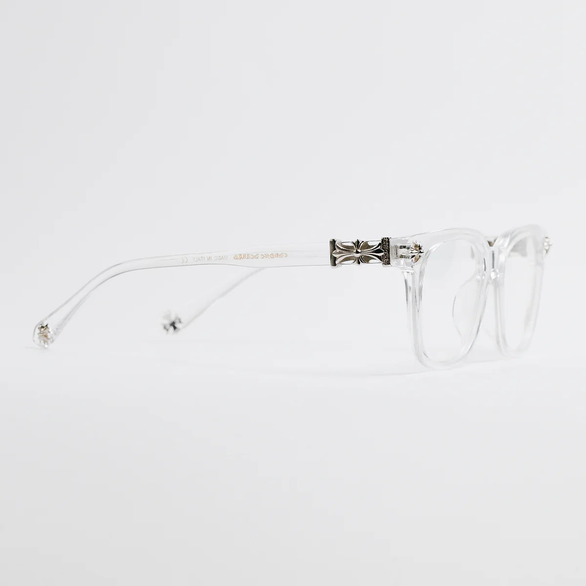 Clear eyeglasses with a decorative temple on a white background